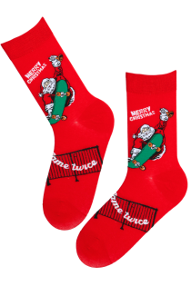 Red cotton socks for men featuring a skateboarding Santa Claus design and text 'Home Tucci Merry Gravmas'.