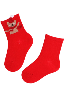 Red children's socks with a bear design for Christmas.