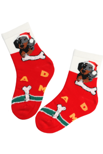 NATALIE red Christmas socks for kids featuring a dog and the word 'DAD', accented with white and green stripes.