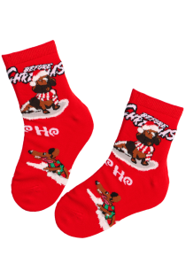 Red children's Christmas socks with dog images, featuring 'Merry Christmas' and 'Ho Ho Ho' text