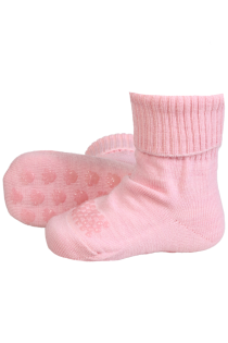 Light pink woolen socks for babies with non-slip heels.