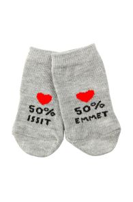 Gray baby socks featuring '50% ISSIT' and '50% EMMET' with heart shapes.