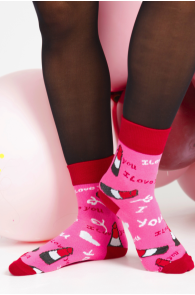 Pink cotton socks featuring lipstick patterns and text, comfortable and stylish.