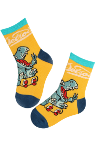 Yellow cotton children's socks with a dinosaur design and the text 'Dino'.