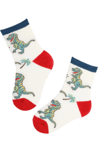 White cotton children's socks with dinosaur and palm tree design, red heels and toes.