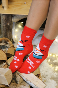 Red Christmas socks with a snowman and snowflake pattern, appear warm and comfortable.