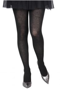ELENA black silk blend tights with moderate sheerness showing partially obscured legs and silver-grey shoes.