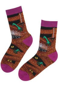 Brown Halloween socks featuring HAZEL pumpkins, spiders, green-handed skeletons, and a purple cuff.