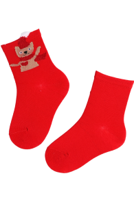 Red children's socks with a bear design for Christmas.