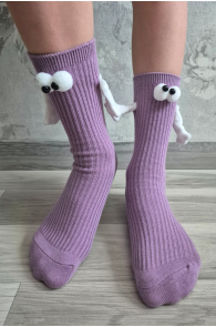 Purple children's socks with a magnetic toy hand attachment