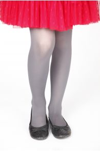 Girls' 50 DEN dark grey tights, worn with a red skirt and black flat shoes.