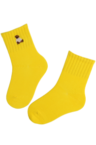 Yellow cotton socks for children, featuring a small bear design