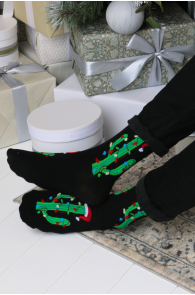 Black Christmas socks with green cactus designs. Suitable for everyday wear.