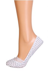White polka-dotted footies, without underfoot support.
