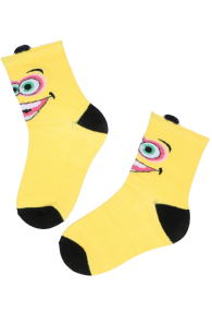 Yellow cotton children's socks with face design and black heels.