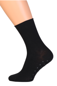Black men's over-the-knee socks with a non-slip sole, appear soft and comfortable