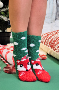 Green Christmas socks with a fox design, appear warm and soft.
