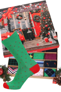Green cotton socks with a red heel, decorated with small white dots, placed beside a Christmas-themed advent calendar featuring 24 pairs of dress socks.
