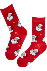 Red cotton socks decorated with Santa Claus and golden stars pattern.