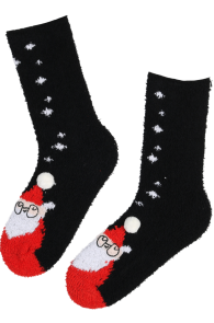 Black cotton knee-high socks that appear soft and comfortable, decorated with a red Santa Claus design on the foot and small white snowflakes.