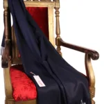 Alpakavillane tumesinine pleed